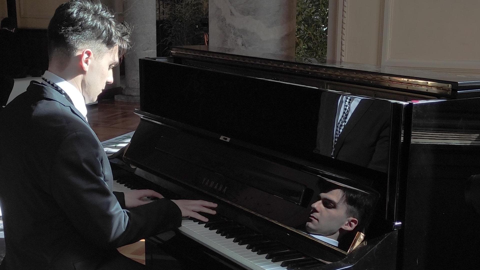 Simone Rebecchi - Pianista professionista con Diploma di II Livello in pianoforte a indirizzo concertistico